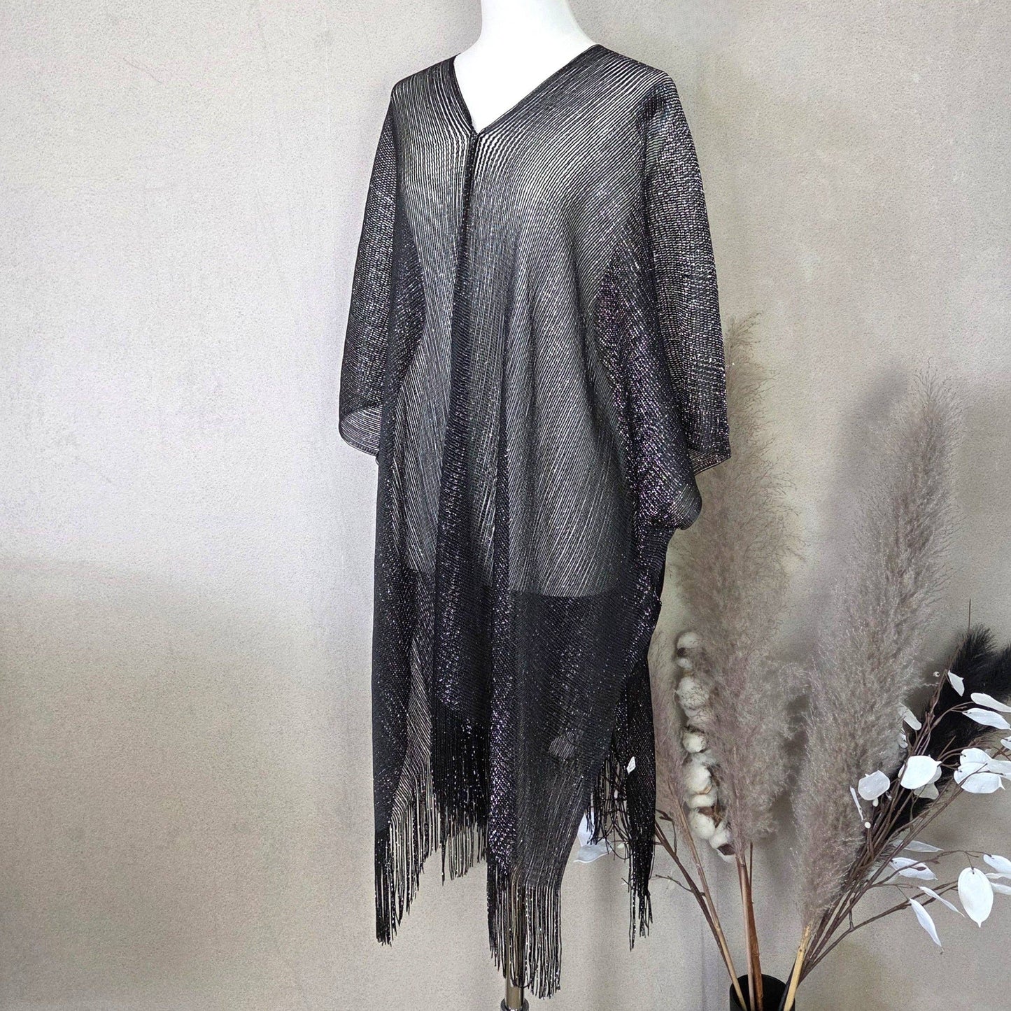 Kaftan with metallic fleck and tassel edge