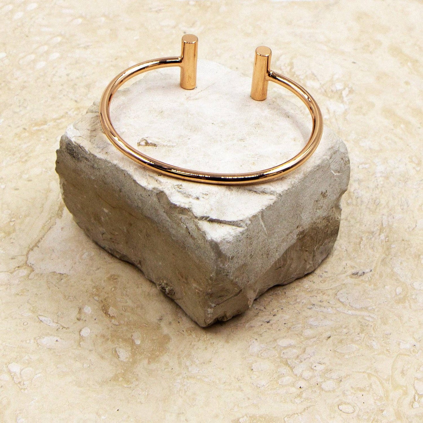 Rose gold open bangle with bar details