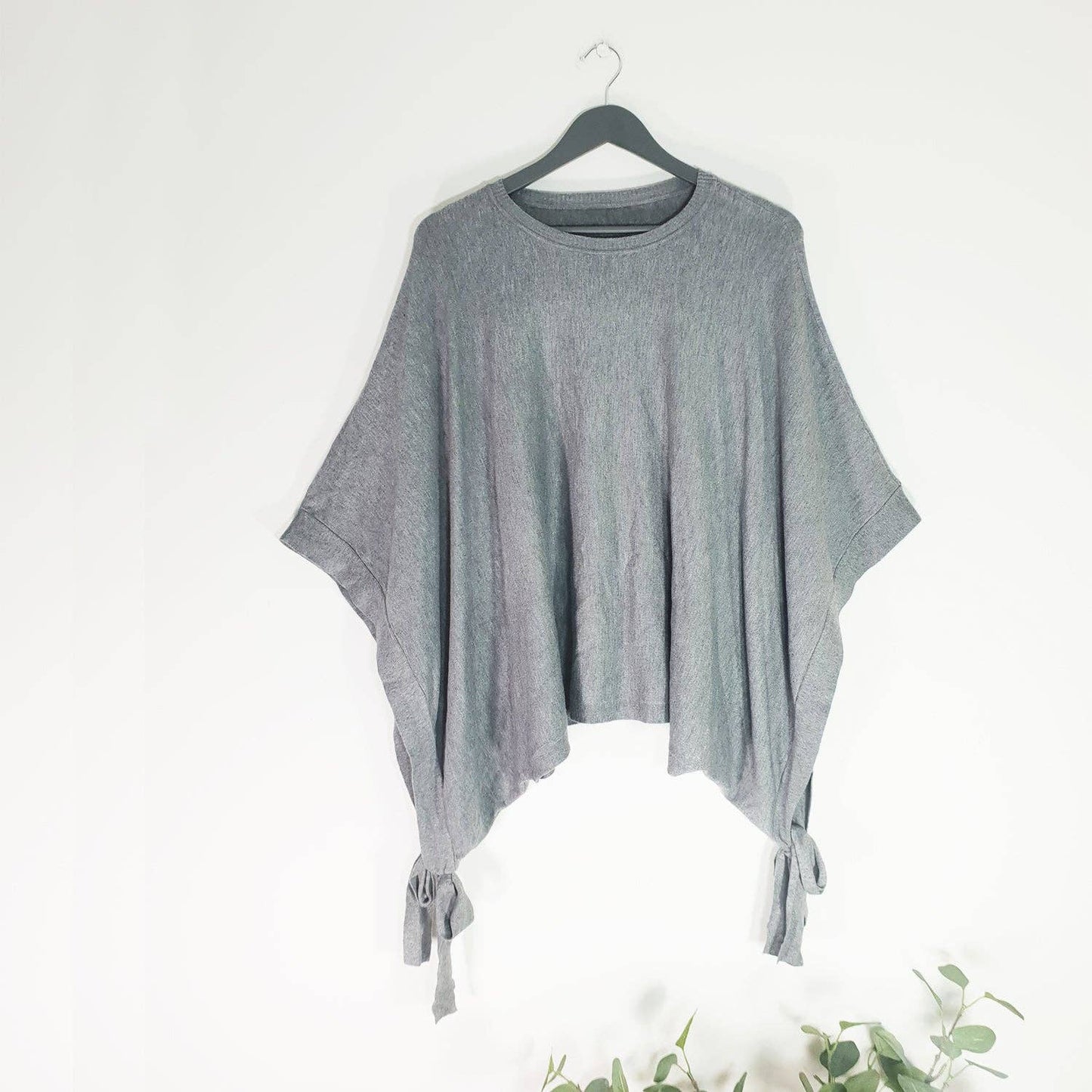 Relaxed poncho with tie side detail
