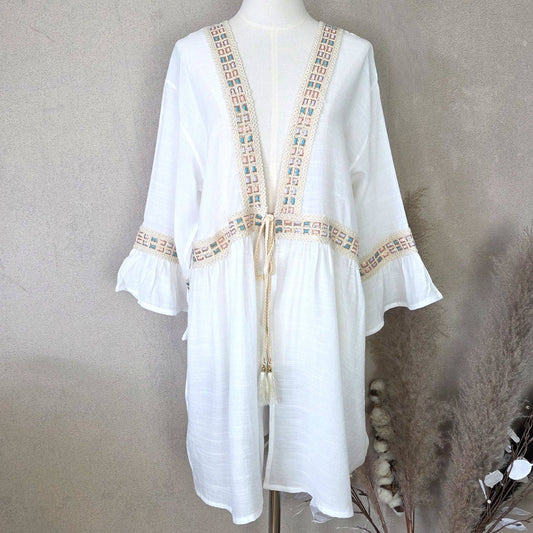 Kaftan with fluted sleeves and pastel embroidery detail and tie