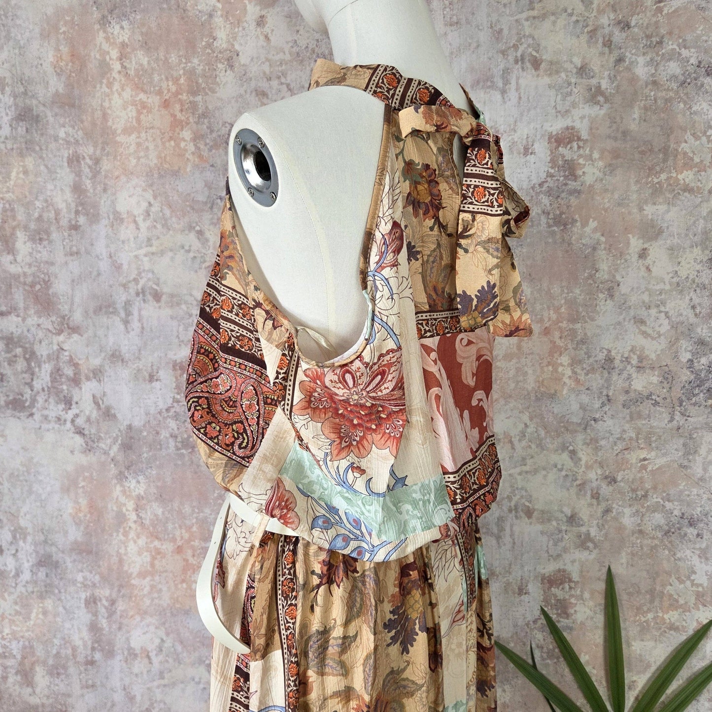 Paisley and flower print halter neck dress with cream belt and gold buckle (M)