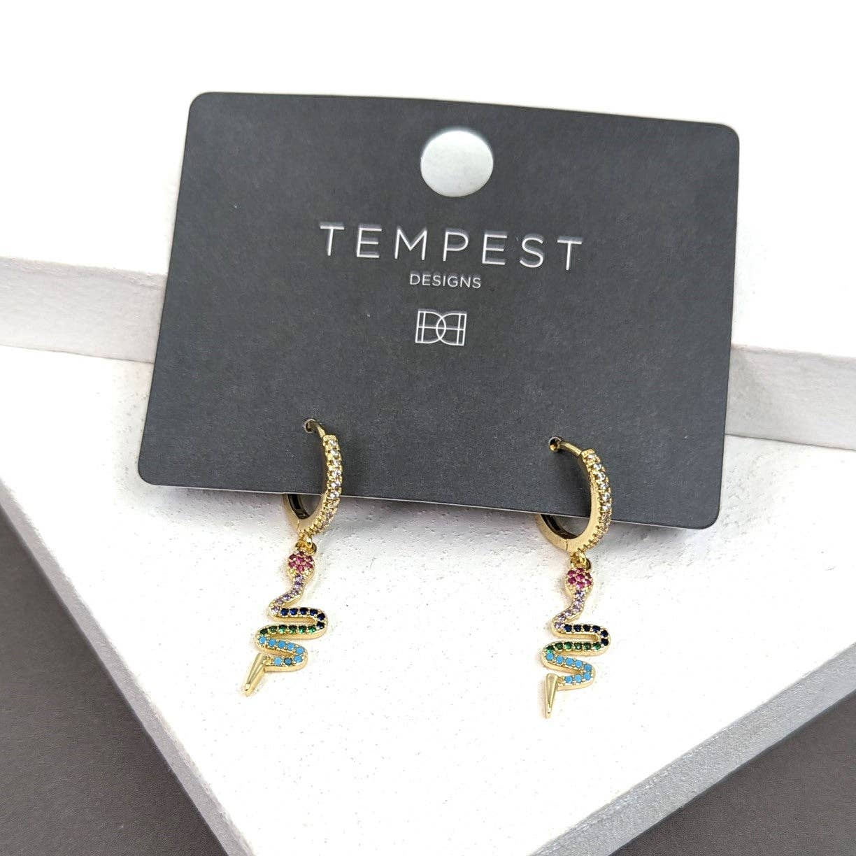 Coloured crystal snake motif on little hoop earrings