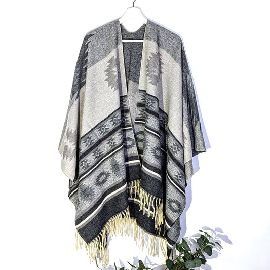 Poncho with tassels