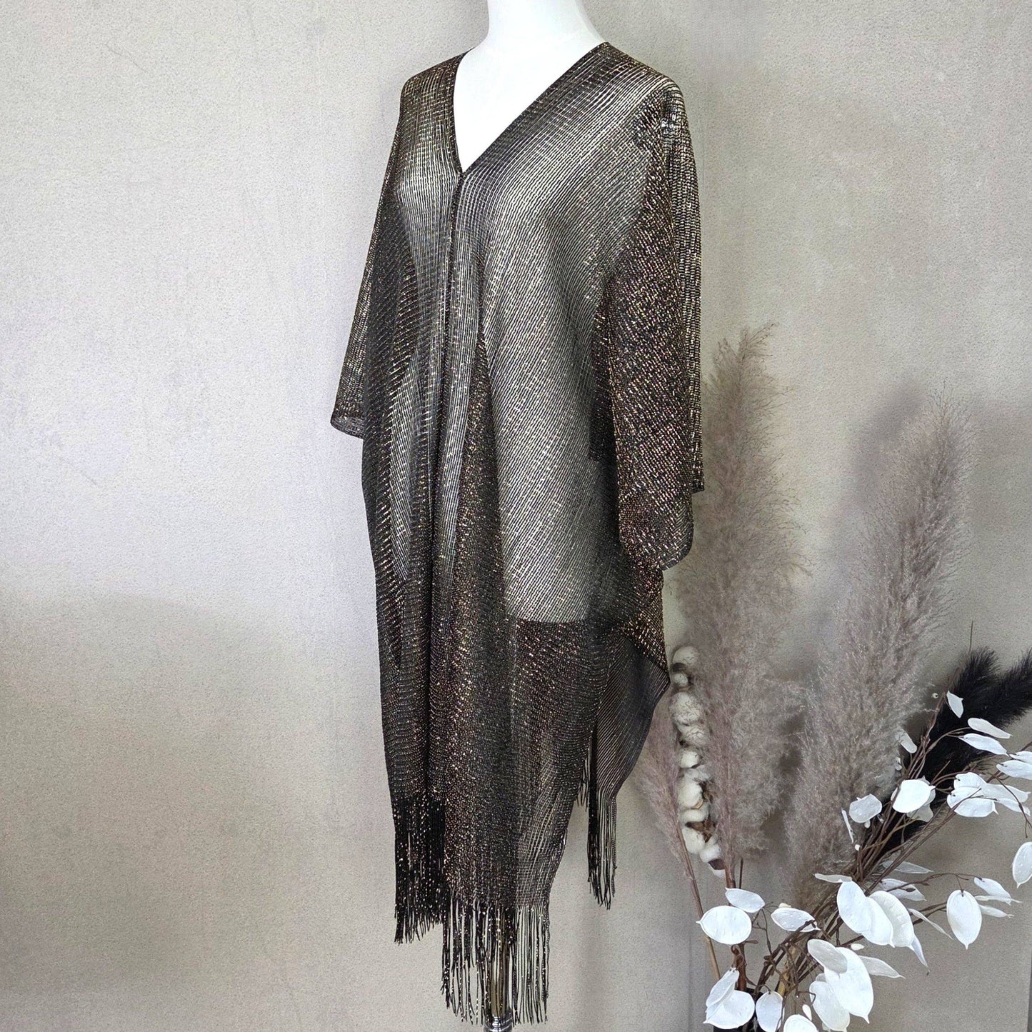 Kaftan with metallic fleck and tassel edge