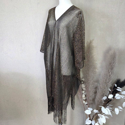 Kaftan with metallic fleck and tassel edge